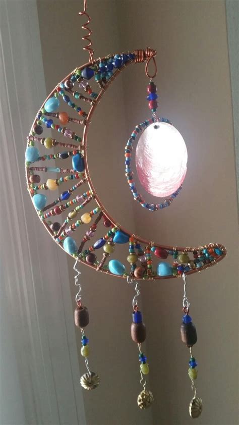 Diy Suncatcher Made With Beads Diy Wind Chimes Wind Chimes Bead Art