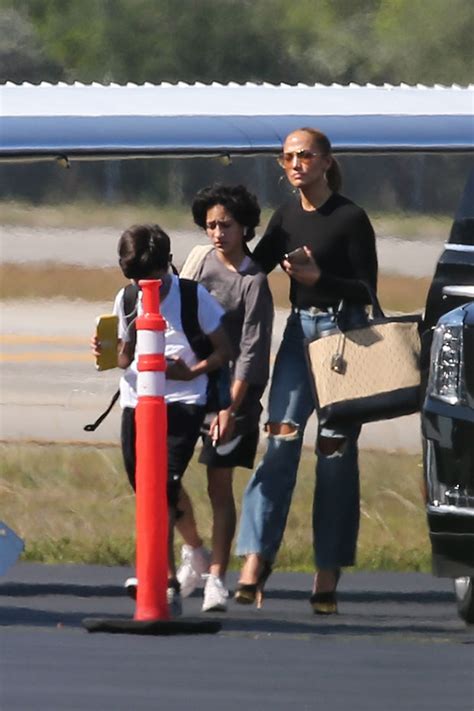 Jennifer Lopez And Twins Max And Emme Board Plane In Miami Pics