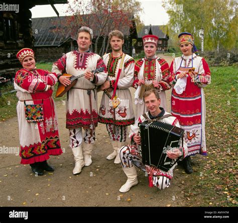 A Russian Folk Music Group In Traditional Clothing In A Small Remote