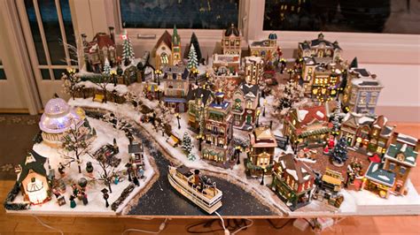 Or, break the christmas village up into a couple rows on your shelf. Christmas Village 2007 Setup | Flickr - Photo Sharing!