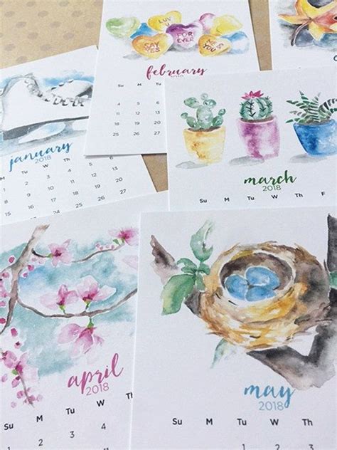 Four Calendars With Watercolor Drawings Of Birds And Flowers On Them