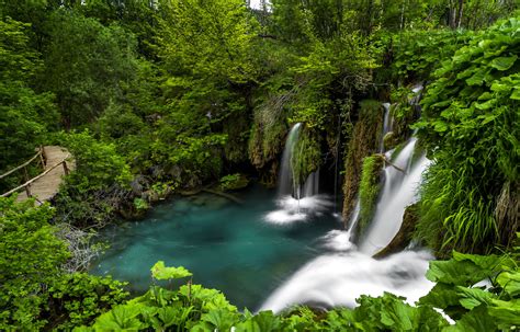 Waterfalls Plitvice Lakes National Park In Croatia Wooden Bridge Green