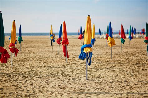 The Famous Colorful Parasols On Deauville Beach Normandy Stock Photo