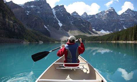 Canoeing With My Son On The Turquoise Waters Of Moraine Lake Alberta