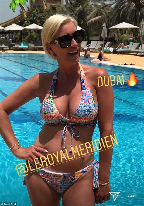 Denise Van Outen Flaunts Toned Physique In Eclectic Printed Bikini