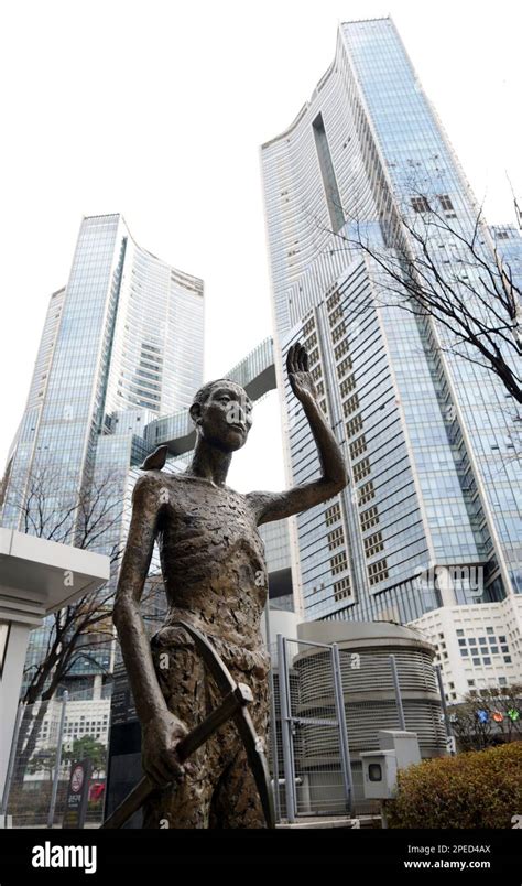 statue of drafted worker is seen in front of yongsan station at the center of seoul in south