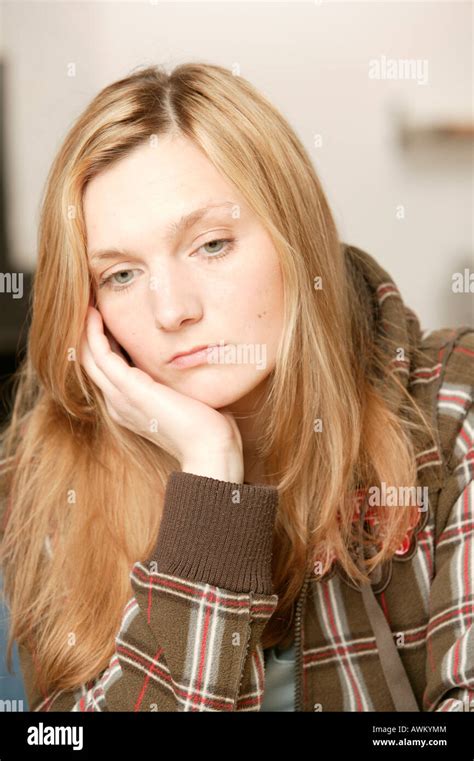 Sad Blonde Woman Looking Down Stock Photo Alamy