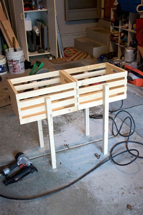 Wooden crates with cracks or holes on their smallest sides are best for this project. How To Build raised Crate Planter in 2020 | Wooden crates ...