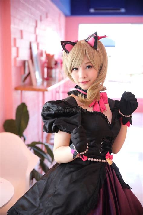 Japan Anime Cosplay Portrait Of Girl Cosplay In Pink Room Background