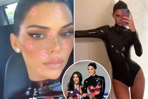 kendall jenner defiantly poses in pvc bodysuit after being laughed off stage with kim kardashian