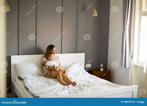 Mother And Little Son Having Fun In Bed Stock Image Image Of Mother