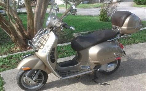 Newly acquired 2011 Vespa 300 GTS ie in metallic bronze