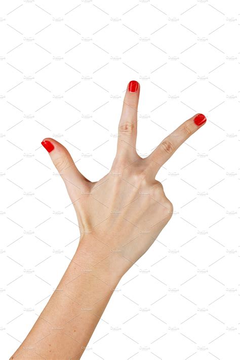 Female hand showing three fingers containing human, isolated, and white