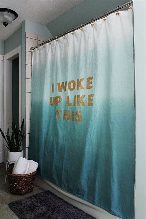 This thick, industrial chain was coated in gold for a glam touch and used to hold back airy white curtains. Budget Bathroom Makeover: 10 Creative DIY Shower Curtains