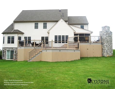 All to help you create the most amazing outdoor living space. Azek Brownstone decking with Azek Brownstone Premier Rail ...