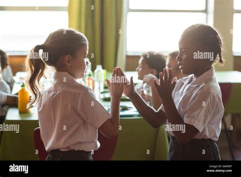 Girls Playing Clapping Game Stock Photo Alamy