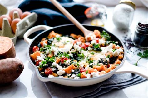 Sweet Potato And Kale Hash With Poached Eggs And Feta Cheese