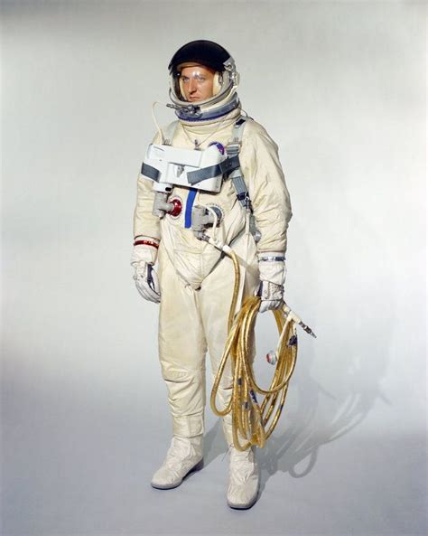 An Astronaut Is Standing In The Studio With His Helmet On And Equipment