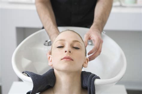 7 out of 7 wore their hair down or clipped up, no fancy styles 4. Woman Getting Hair Wash From Hairstylist In Salon Stock ...