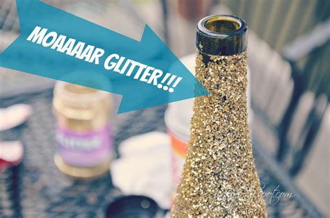 A few paint sprays and glittery adhesives are all you need to start working on this project. Tutorial for DIY Glittered Wine Bottles | It's @jennyonthespot!