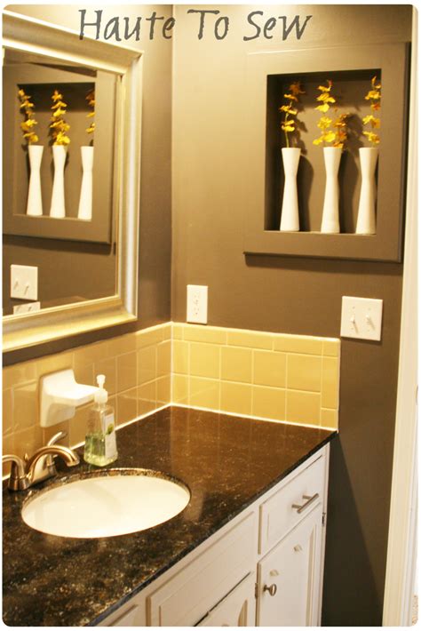 Tile is often the most used material in the bathroom, so choosing the right one is an easy way to kick up your bathroom's style. Remodelaholic | Bathroom Makeover; Yellow & Gray Color Scheme