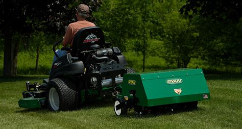 You just use the rake to steady your aerator and give yourself a brace for pushing it into the ground. Lawnaire Tow-Behind Aerator | RYAN Turf Renovation Equipment