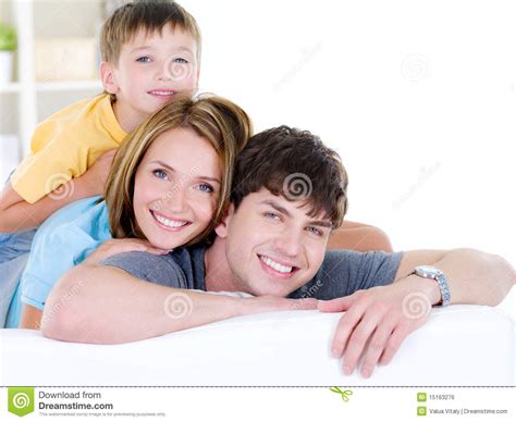 Three families part i (2010). Happy Smiling Family Of Three People Stock Photo - Image: 15163276