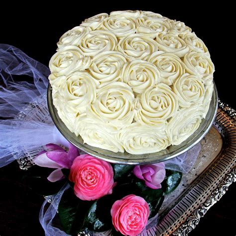 Plop the icing on the totally cooled (and even slightly cold is best) cake, then spread it thinly with a knife. Red Velvet Rose Cake & Cake Decorating Tutorial possible ...