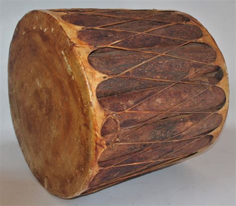 Hand carved horse design mirror c 76cm chocolate. Indian Drum / Side Table at 1stdibs