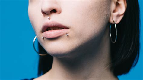This Dermal Piercing Removal Video Will Make You Rethink Your Next Piercing Allure