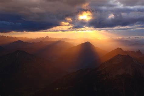 Glorious Sunset Over Mountain Peaks Photos In  Format Free And Easy