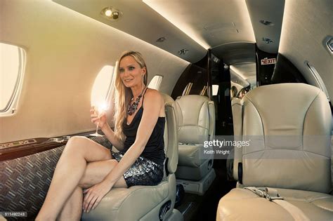 Beautiful Blonde Woman Flying On A Private Jet Photo Getty Images