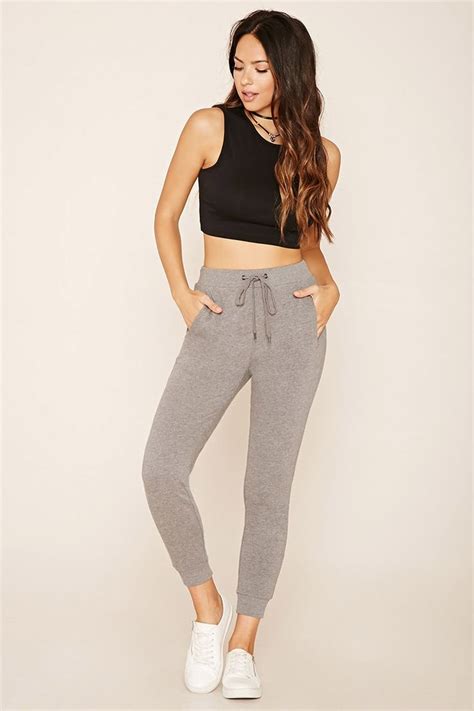 A Pair Of Sweatpants Featuring An Elasticized Drawstring Waist Ribbed