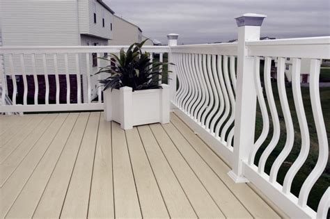 Your deck or porch with one of our aluminum or composite railing systems, . Vinyl PVC Belly Deck Rail System | Unique Deck Railing Designs