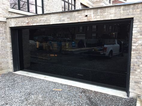 Your garage door is the biggest door in your home and it can be inconvenient at best, catastrophic at worst when that door won't open. Glass Garage Doors Installation | Smart Doors