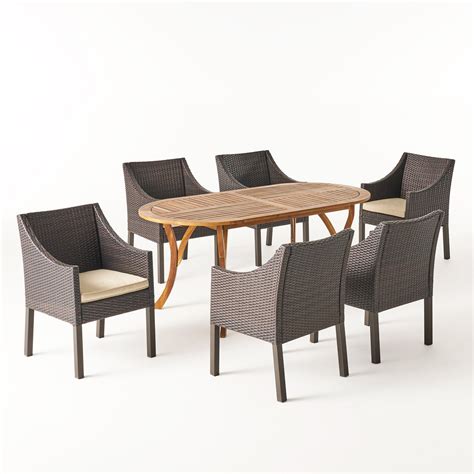 Joan Outdoor 7 Piece Acacia Wood And Wicker Dining Set Teak With Mult