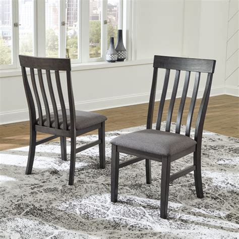 French country dining room features a wood beaded chandelier illuminating a reclaimed wood dining table lined with a homegoods bench and linen dining chairs from world market. Luvoni White/Dark Charcoal Gray 5 Piece Rectangular Dining ...