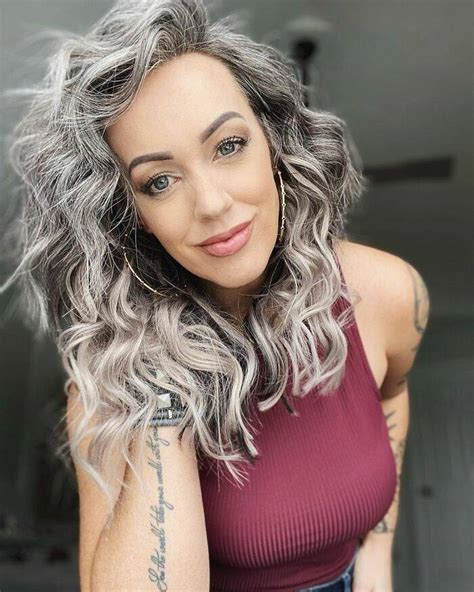 41 year old woman decides to stop dyeing her hair after it started going gray in her early 20s