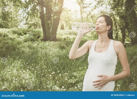 Pregnant Woman Drinking Water After Exercise Stock Photo Image Of