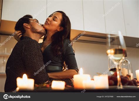 Beautiful Passionate Couple Having Romantic Candlelight Dinner Home Kissing Stock Photo By