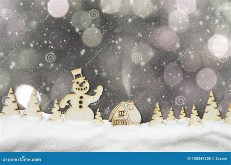 Christmas Background With Silver Bokeh Falling Snow Snowman Hut And