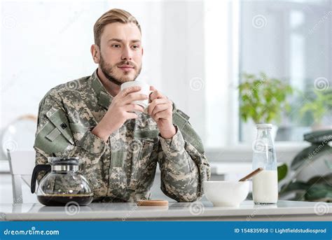 Handsome Man In Military Uniform Drinking Coffee Stock Photo Image Of