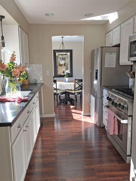 This week on today's homeowner we're going to show you ten easy steps to a successful kitchen remodel. A Small Kitchen Tour | Galley kitchen design, Galley ...