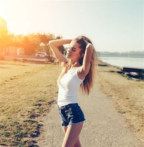 Beautiful Girl Enjoying A Sunny Day Free Photo