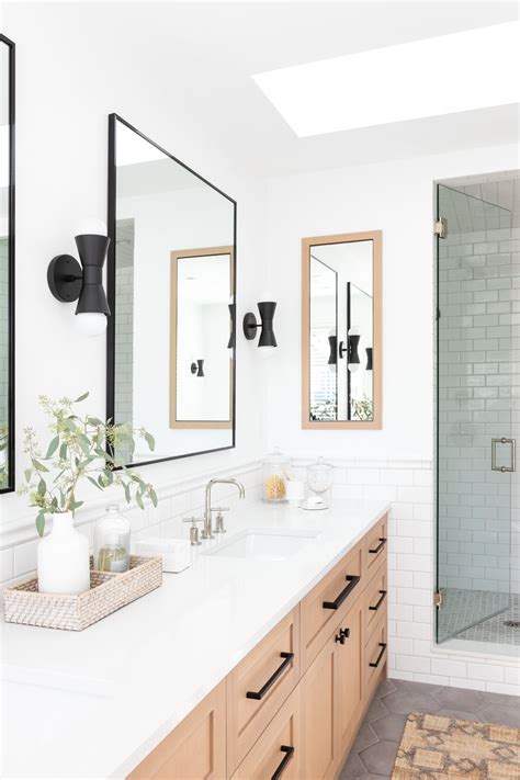 Bathroom vanities | buy bathroom vanity cabinets and bathroom furniture online. White bathroom bathroom with brack mirrors and lighting ...