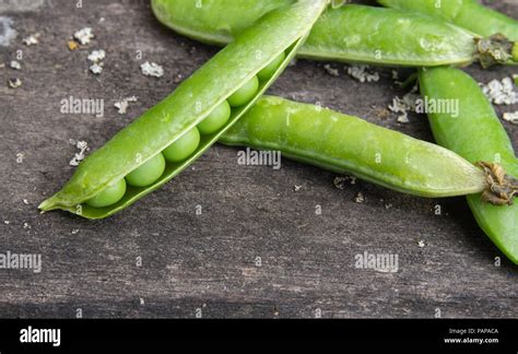 Peas In Pods Stock Photo Alamy