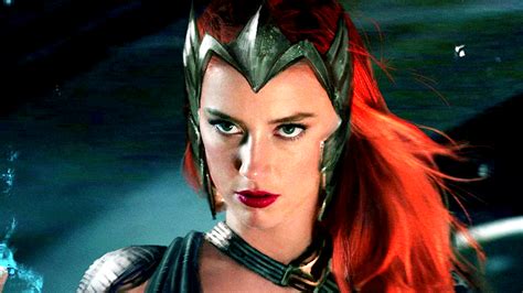 See Amber Heard Unable To Sit Down Because Her Costume Is Too Tight