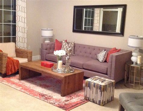 See more ideas about green sofa, interior design modern sofas. Sage green sofa with orange and navy blue accent. | Green ...