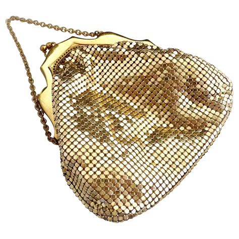 Maybe you would like to learn more about one of these? Whiting Davis gold mesh purse c. 1920s from victoriascurio on Ruby Lane