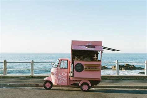 Food trucks have roared into popularity in recent years, with several varieties of them located along the streets in various cities and featuring numerous food offerings. Food Truck Seeling Baked Goods by Bruce And Rebecca Meissner
